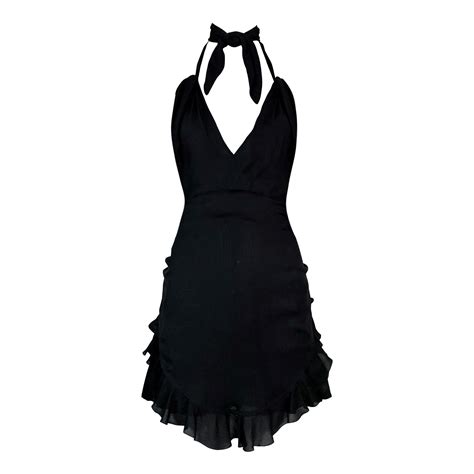 chanel black dress|Chanel backless black dress.